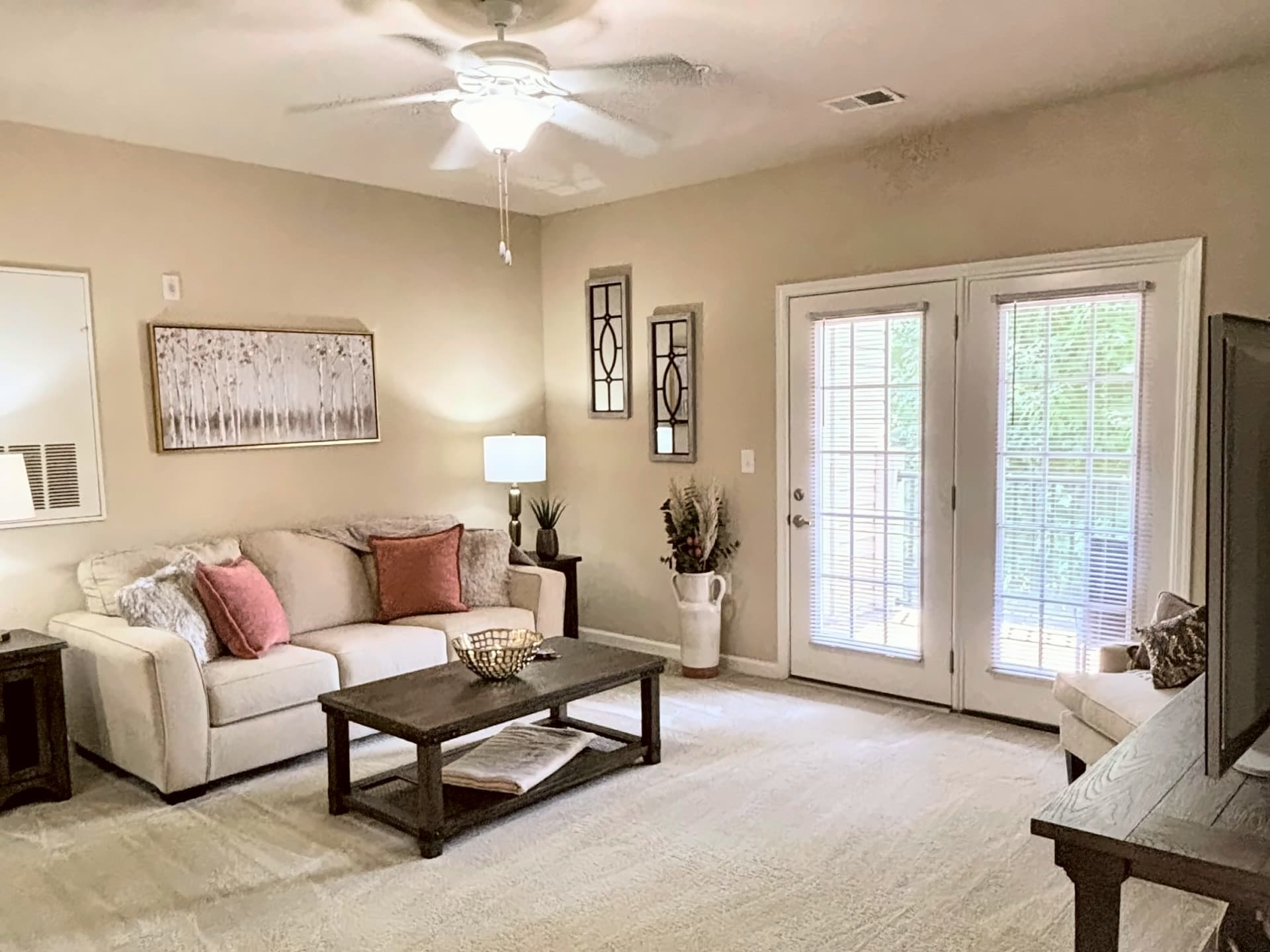 Living room in a 1-bedroom, 1-bathroom apartment at Clemmons Town Center