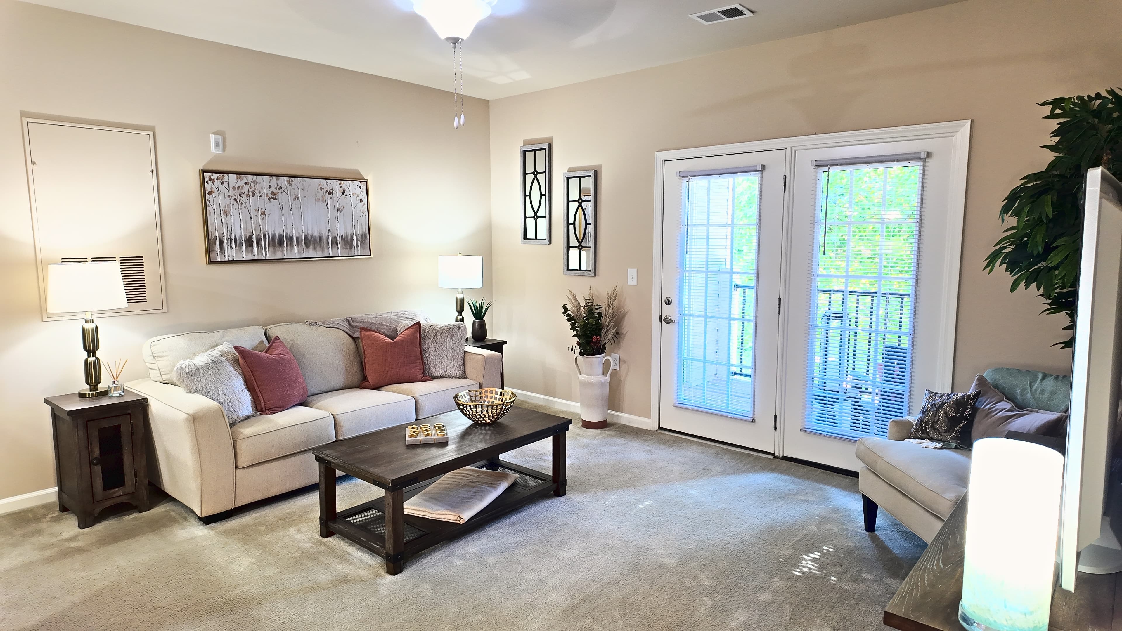 Living room in a 1-bedroom, 1-bathroom apartment at Clemmons Town Center