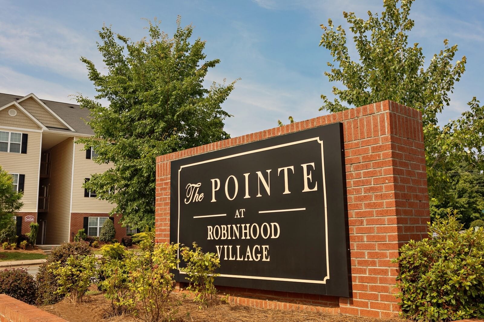 The entrance at The Pointe at Robinhood Village